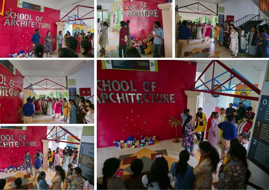 Two men in bicycle jerseys sitting outside at table having coffee